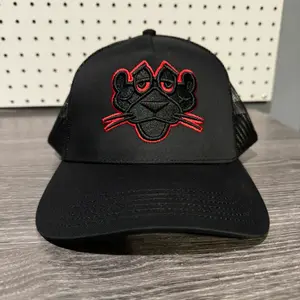 Red Panther Curve Visor Trucker hat.