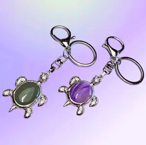 Sea Turtle Keychains Crafted from Natural Stone Crystal Durable and Long Lasting Inspired by Graceful Ocean Turtles Eye Catching Addition to Any Key Set