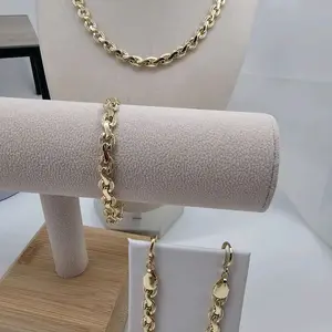 3 pieces  earrings, necklacet 18 inches  and bracelet 7.5 inches 18 k Gold laminated