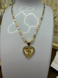 Cadena de 3 oros laminado 22” aproximadamente con dije la milagrosa