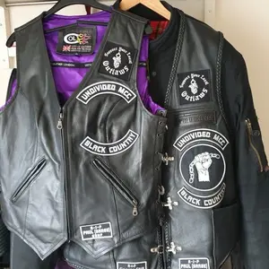 Black Leather Vest with Purple Lining and Multiple Patches for Biker Style