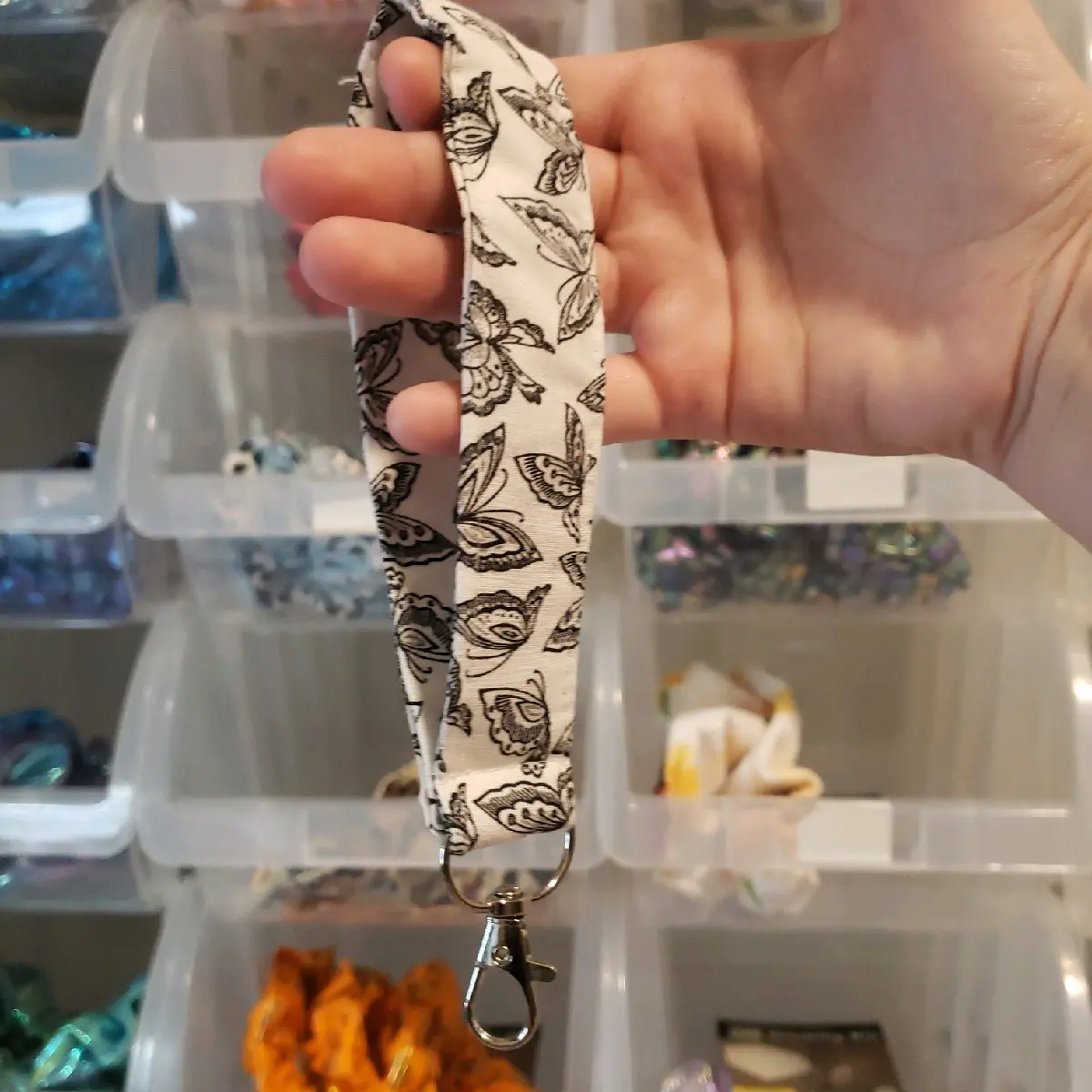 Butterfly wrist lanyard