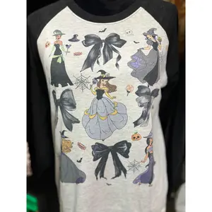 Magical girls long sleeve graphic tee with bows and a spooky vibe