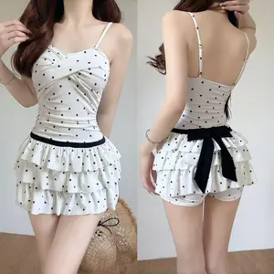 2026 New Vintage Polka Dot Ruffle Skirted Swimsuit Women Backless Crossover Front One-Piece Swimwear Cute Beach Bathing Suit