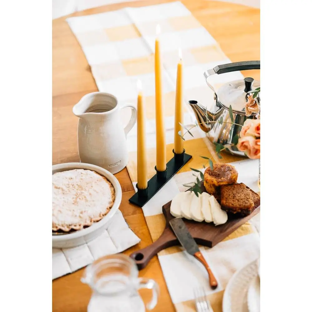 The Triple Candlestick Holder