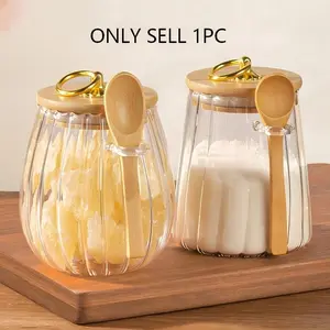 Glass sealed jars for storing coffee beans, berries, sugars, with wooden spoons, strong sealing. Jam, small biscuits, kitchen condiments, tea and other storage jars, suitable for various storage scenarios, kitchen supplies.