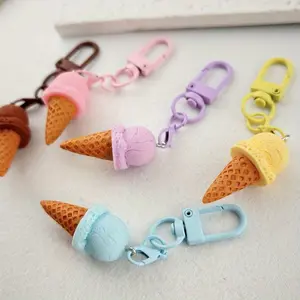 5 sweet and colorful ice cream keychains. They are lovely summer charms, creative and fun ice cream chocolate keychains, realistic ice cream keychains, and bag pendants.