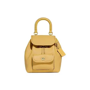 COACH Riya 21 Drawstring Buckle Closure Leather Backpack for Women in Yellow