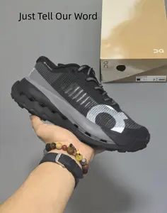 Black mesh trail trainers with grey overlays & rugged hollow cushion soles