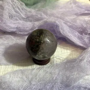 Garden clear quartz sphere