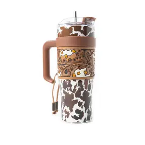 Western Brown & White Cow Print 40oz Tumbler – With Removable Tooled Leather Sleeve