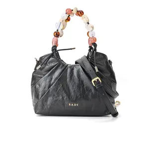 All-match, fashionable and classic women's dewdrop bag, suitable for single-shoulder or crossbody carrying. Leather Satchel