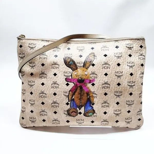 Pre-owned Other Clutch MCM Bag Beige PVC 12668268588/515228