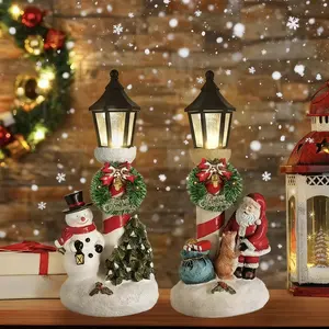 Festival Snowman and Santa Claus LED Lanterns - Resin-made illuminated decorations, in red and white color scheme, suitable for home, office or party use, featuring elements of a snowman, Santa Claus and green plants, for Christmas festival decoration