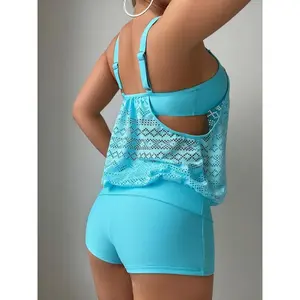 Two-piece tankini set with cross straps and hollowed-out flat shorts
