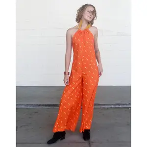 70S INSPIRED ORANGE SLEEVELESS HALTER TOP JUMPSUIT WITH MANDARIN ORANGE DIAGONAL ZIPPER PRINT