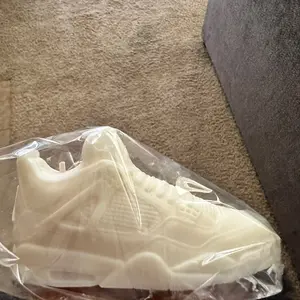 Custom scented shoe candle made with soy wax