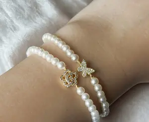 Adjustable Pearl Charm Bracelet – Stretchy Fit with Gold Butterfly or Flower Accent