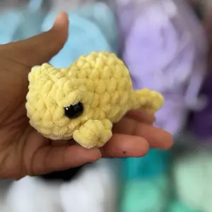 Hand-crocheted shooting frogs