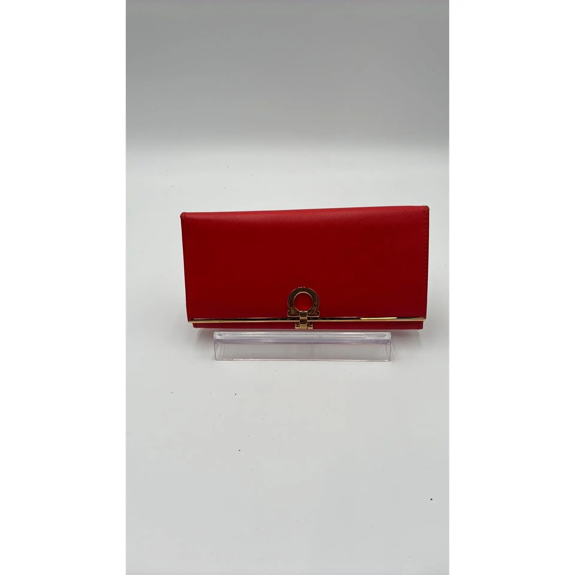 Pre-owned Leather Luxury Bags & Accessories Salvatore Ferragamo Gancini Continental Wallet, Orange Date Code: GJ224633Y. Entrupy ID: QWVGWKB. CHICAGO