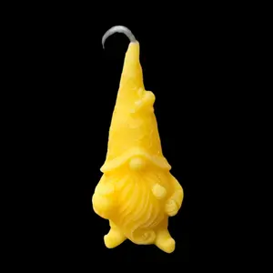 **“Buzzing Gnome Haven: Hand-Poured Beeswax Candle"**  This piece blends the charm of a gnome with the natural allure of a beehive, creating a delightful and imaginative candle.