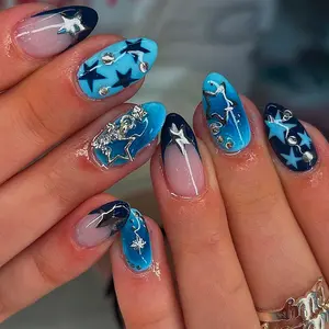 24 pcs of almond nails acrylic press on nails, featuring a starry sky design with dark blue gradient, gold foil stars, and French tips. Y2K style with 3D metal stars, rhinestones, Bling rhinestone decoration, perfect for girls
