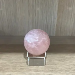 Rose Quartz natural crystal sphere with clear stand