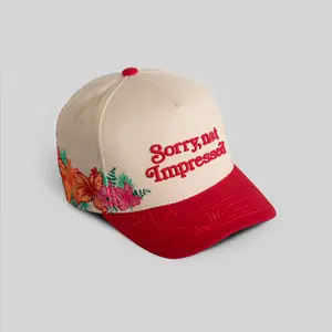 Field Grade Sorry Not Impressed Sand Red Floral | trucker hat | floral design | twill material | beige red | embroidered | adjustable | unisex | casual | mesh back | streetwear | dad hat | Trendy Hat 2026 | Streetwear Headwear | Fashion Cap | Summer Hat