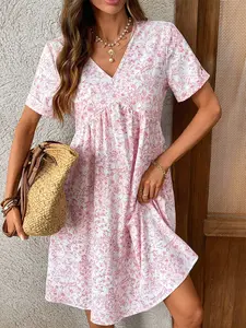 A women's pink and white floral V-neck short-sleeved loose fashion dress, featuring a fresh and sweet casual style, suitable for spring and summer, perf for picnics, gatherings, and daily casual wear.