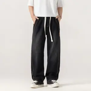 Men’s loose wide-leg jeans with a high cotton content for comfort and lightness; men’s retro long pants for autumn/winter, featuring an elastic waistband and drawstring design—perfect for outdoor casual streetwear activities.