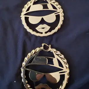 Low rider girl hoop earrings