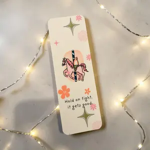 Carousel Cat Bookmark – “Hold On Tight, It Gets Good” – Cute Reading Bookmark