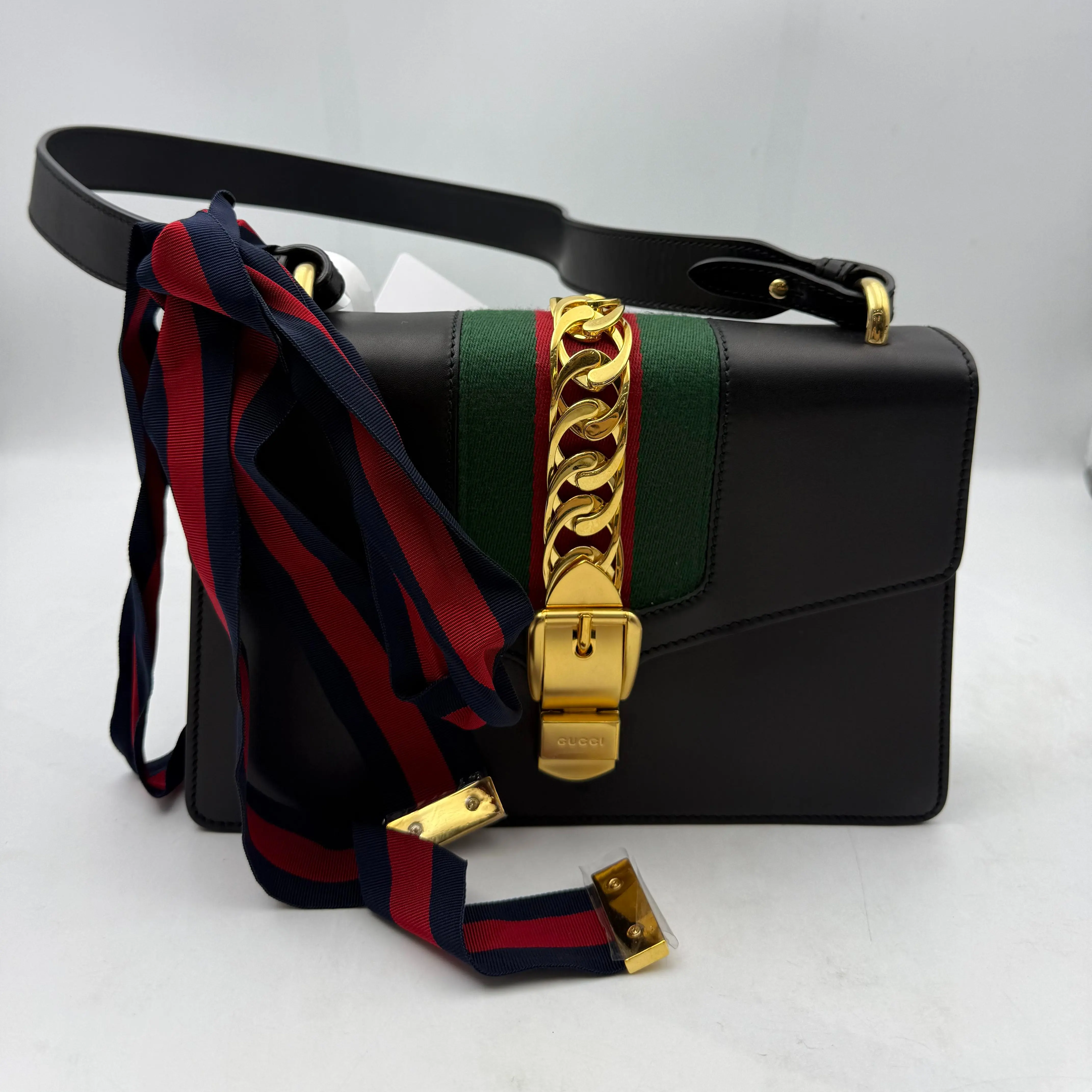 Pre-owned GUCCI Sylvie Small Shoulder Bag, Black Smooth Calf Leather, Web Stripe Flap Crossbody Handbag