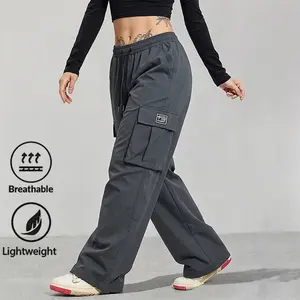 Women’s summer lightweight loose sports pants with multiple pockets — adjustable drawstring waistband, non-stretch fabric, machine washable; lightweight, skin-friendly material with a smooth touch—suitable for indoor workouts and outdoor activities in sum