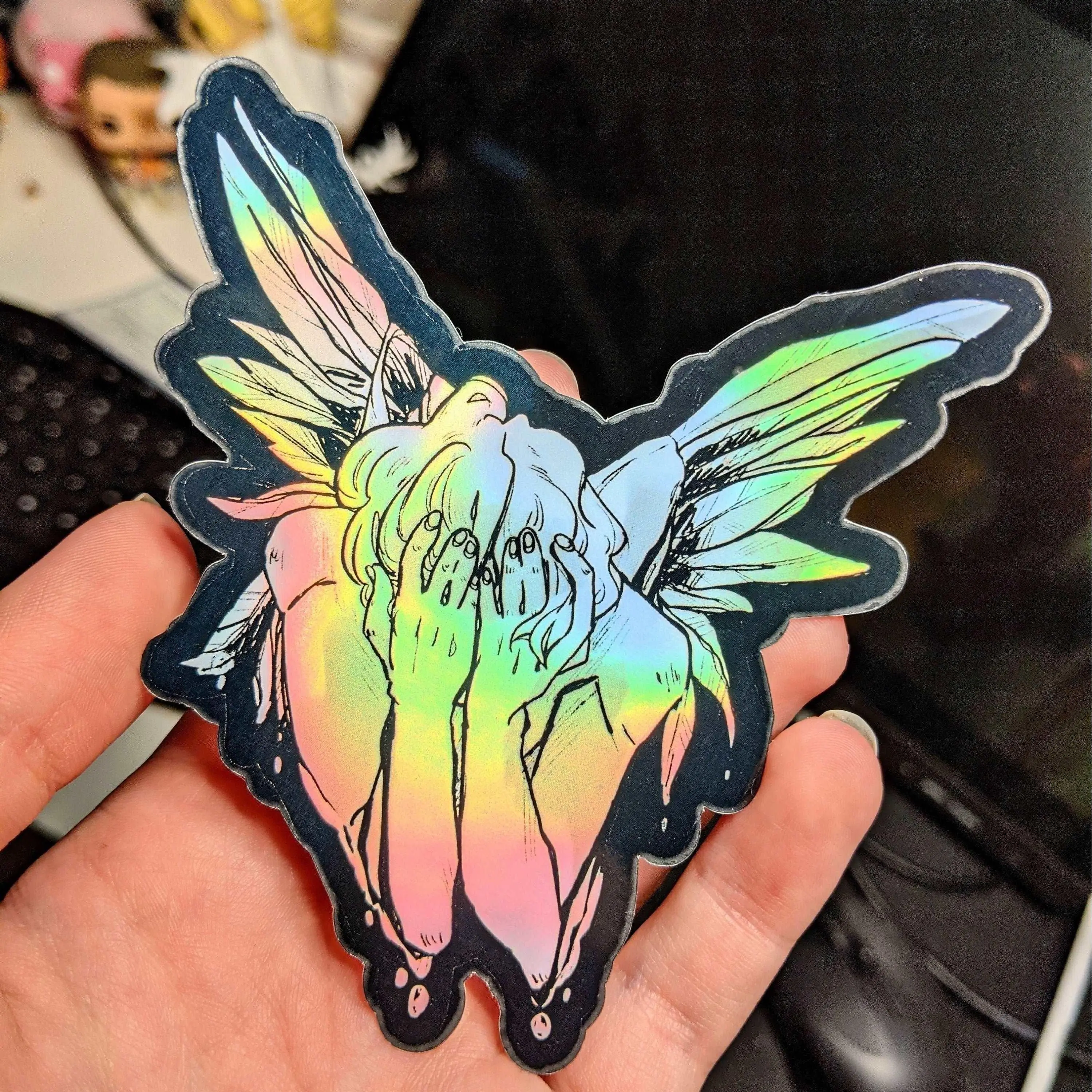 Holographic Fallen Angel Sticker - TikTok Shop
