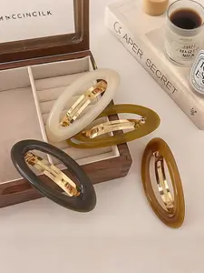 A multi colored optional fashionable oval shaped hair clip is suitable for daily wear, vacation and dating occasions, and is also a surprising and exquisite small gift Flat Claw Clips