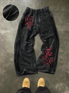Men's youthful street style sweatpants, made of cotton with a vintage distressed wash, featuring an oriental plum blossom design, street fashion, and comfortable and stylish wear. Perfect for rappers and as a holiday gift.