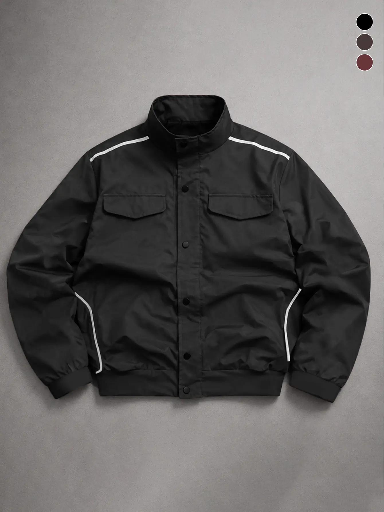 Men’s black stand-collar buttoned aviator jacket with contrasting white topstitching pocket details, loose minimalist workwear outerwear, retro urban everyday street jacket