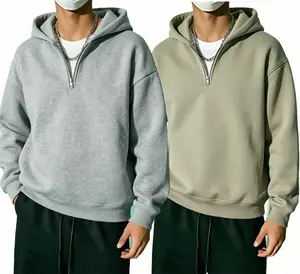 Men’s half-zip hooded sweatshirt, available in multiple colors, featuring a relaxed drop-shoulder fit and soft, skin-friendly fabric; suitable for daily commuting, street style, and casual outings—a versatile piece for autumn and winter.