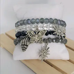Handmade Crystal Stretchy Bracelets. Clear, Grey & Silver w/charms. Sold as a set.