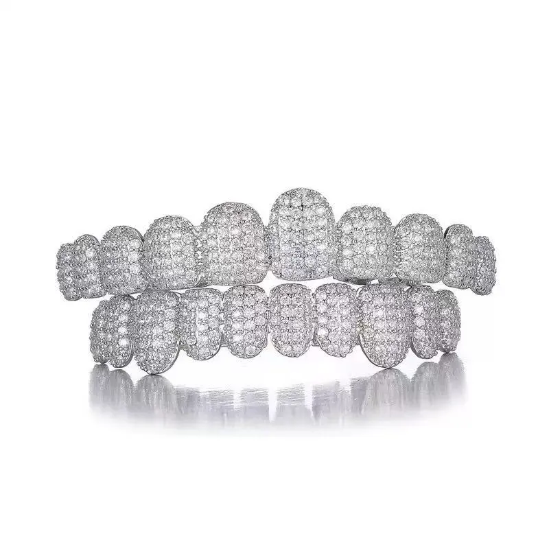 Hip-hop style - teeth with tiny diamonds embedded in the braces. Dental accessories, jewelry in the air, a gift.
