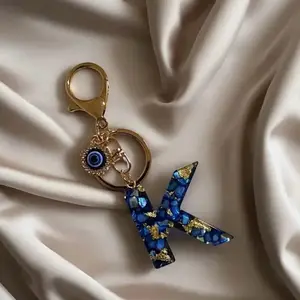 1pc Stylish Blue Evil Eye Resin Letter Keychain | Golden Accents