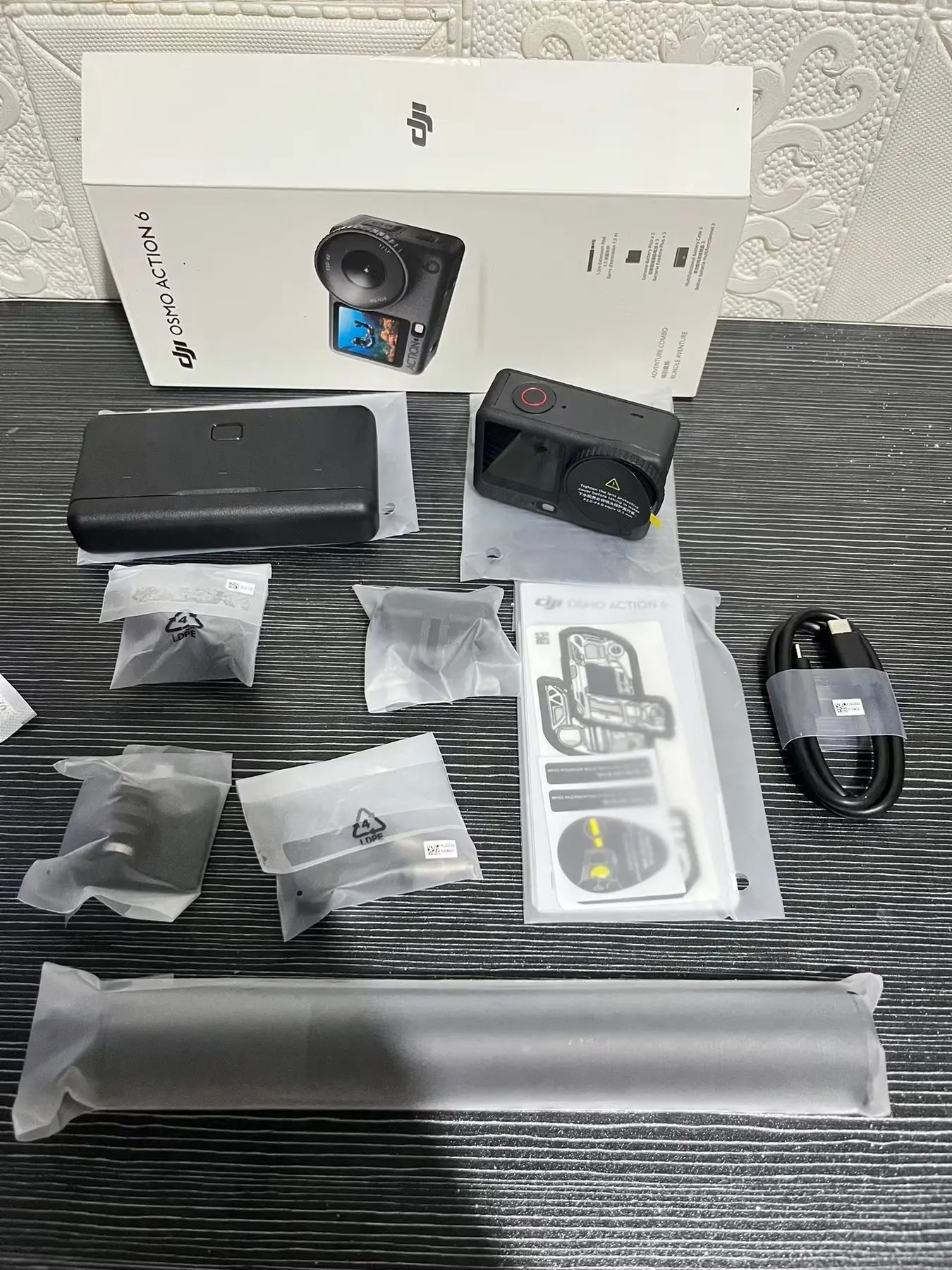 DJI Osmo Action 6 Adventure Combo, 4K120fps, 1/1.1" Sensor, f/2-f/4, 4h Battery Bundle with Deco Gear Action Kit Silicone Case + Sandisk 128GB Memory Card + CPS 1 Year Enhanced Protection Pack