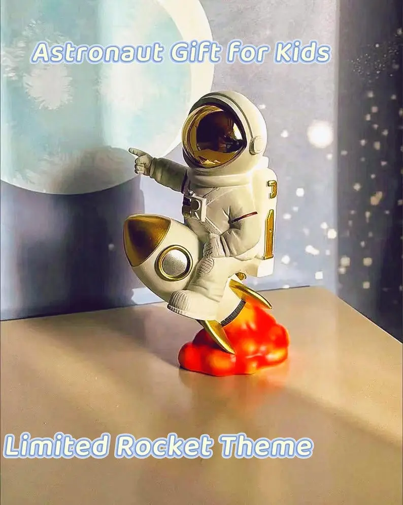 Handcrafted Astronaut Rocket Sculpture: Gold Accent Resin Figurine