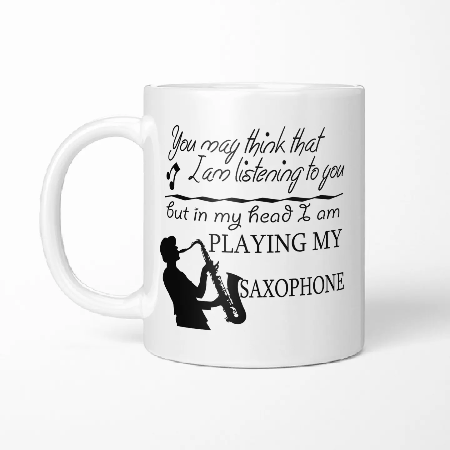 Must-have for Saxophonists! 🎷 This mug says it all: "Listening to you, but playing my sax in my head." 🎶 Perfect gift mug! #Saxophone #MusicianLife #GiftMug