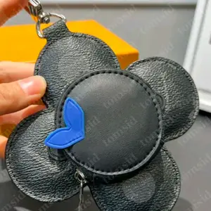 Adorable Black Leather Charm Keychain with Blue Heart Accent Unique Design Key Accessory