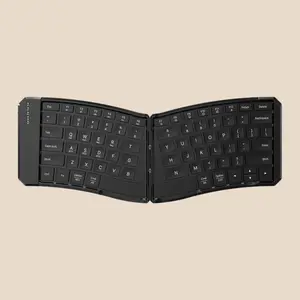 V-shaped Folding Tilt Key Bluetooth Keyboard Ergonomic Three Bluetooth Portable Laptop Tablet Phone Folding Keyboard