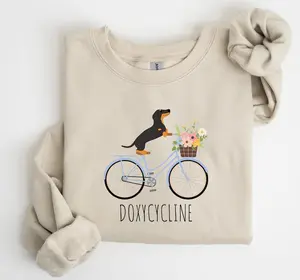 (Sale Off Up To 50%)  Doxycycline Pharmacy Pun Sweatshirt, Dachshund on Bicycle, Pharmacists Shirt, Pharmacists and Technicians Gift, Veterinary, Pharmacist Gifts