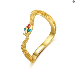 Mytys Gold-Tone Textured Snake Cuff Bangle with Colored Gemstone Accents, Statement Jewelry for Bold Styling & Special Occasions