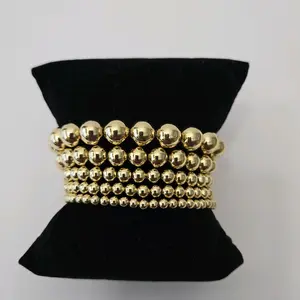 #69.  18K Gold Plated 5 in Beaded Elastic Bracelet Different Sizes